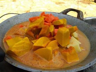 Nice vegan pumpkin curry in a old style Thai wok.